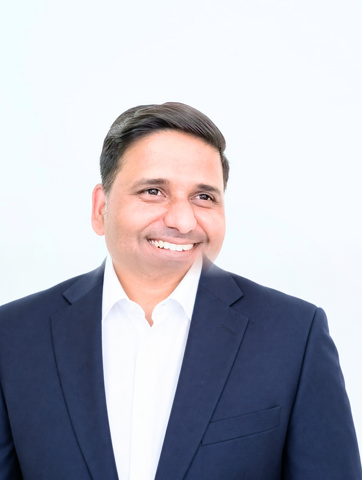 Datta Rokade wearing a navy blazer